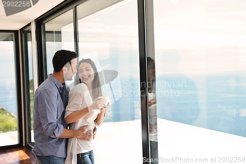 Image of relaxed young couple at home