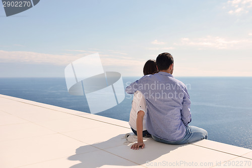 Image of relaxed young couple at home