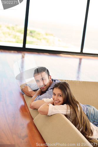 Image of relaxed young couple at home