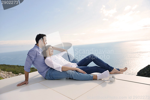 Image of relaxed young couple at home