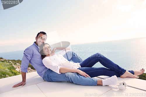 Image of relaxed young couple at home