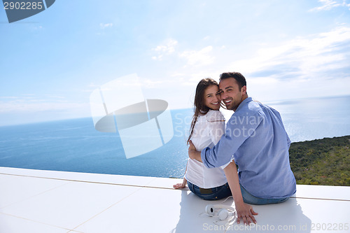 Image of relaxed young couple at home