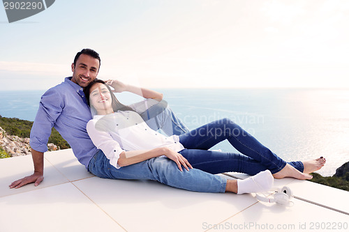 Image of relaxed young couple at home