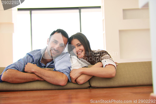 Image of relaxed young couple at home