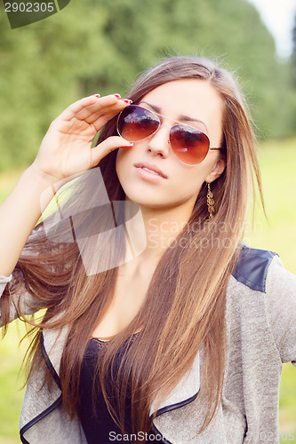 Image of Portrait of charming lady woman girl with sunglasses