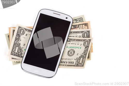 Image of cellphone and money on white