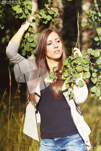 Image of Portrait of a charming lady woman girl outdoor