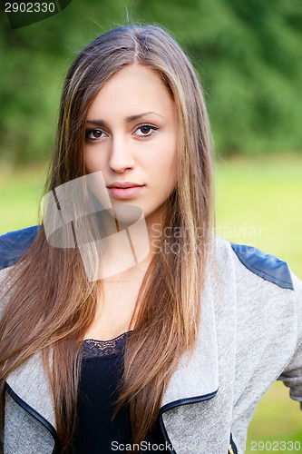 Image of Portrait of a charming lady woman girl outdoor