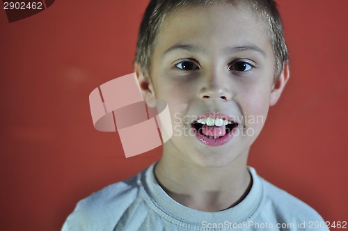 Image of portrait of excited small boy