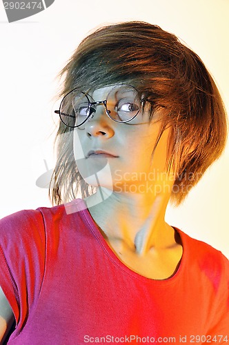 Image of child wearing glasses