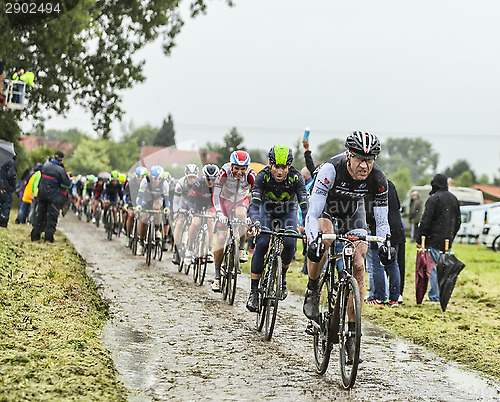 Image of The Cyclist Jens Voigt on a Cobbled Road - Tour de France 2014