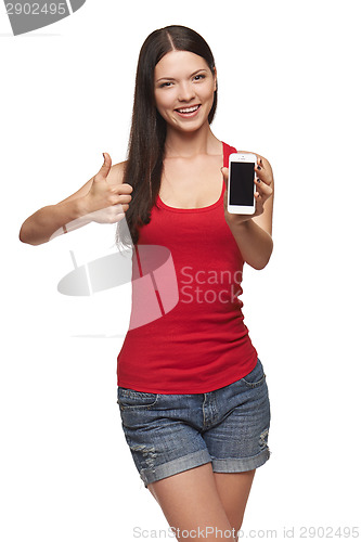 Image of Happy woman showing cell phone