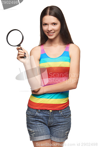 Image of Woman with magnifying glass over white background