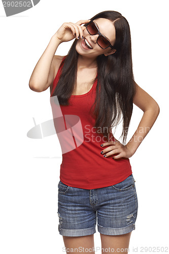 Image of Happy playful woman in sunglasses