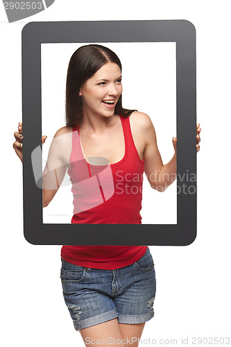 Image of Woman looking to the side through frame