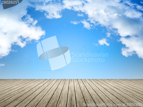 Image of wooden jetty blue sky 