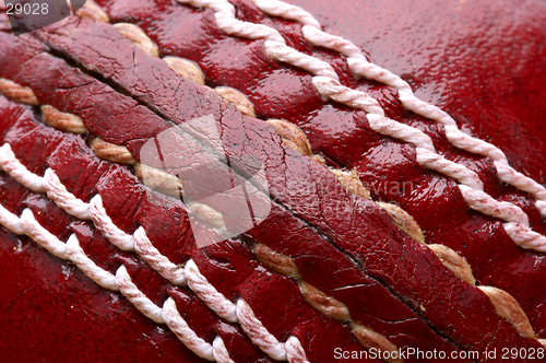 Image of Close up shot of a red cricket ball