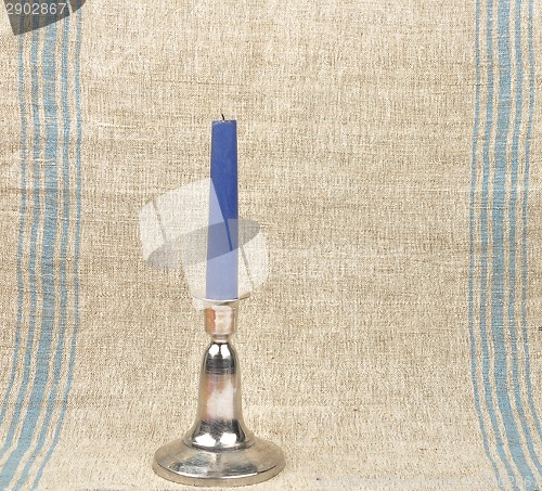 Image of Candleholder on linen background