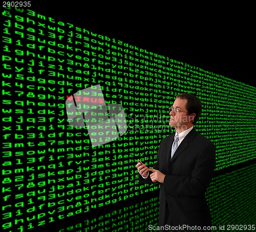 Image of Man detecting computer virus in a firewall of machine code