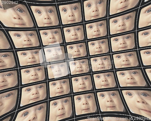 Image of Distorted video screens showing the faces of a baby