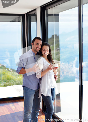 Image of relaxed young couple at home