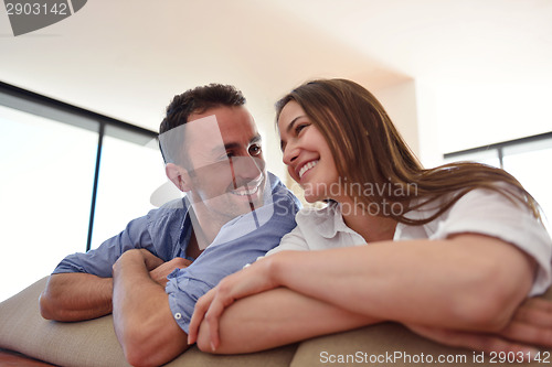 Image of relaxed young couple at home