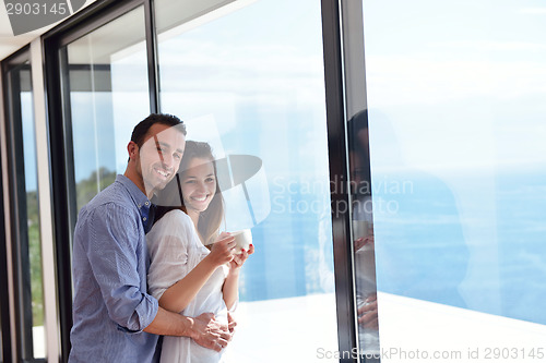 Image of relaxed young couple at home