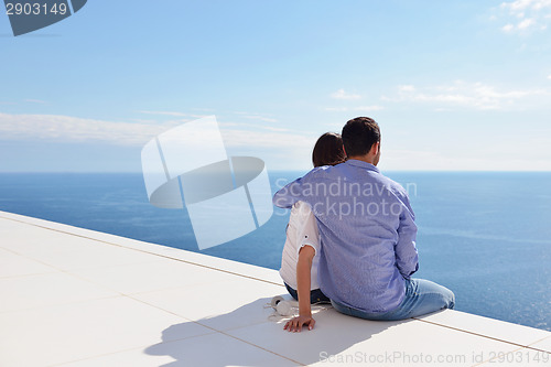 Image of relaxed young couple at home