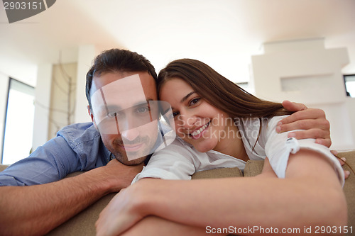 Image of relaxed young couple at home