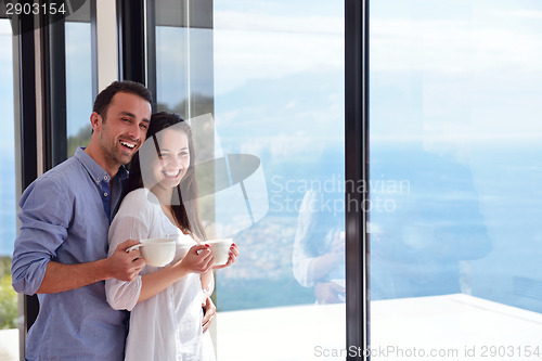 Image of relaxed young couple at home
