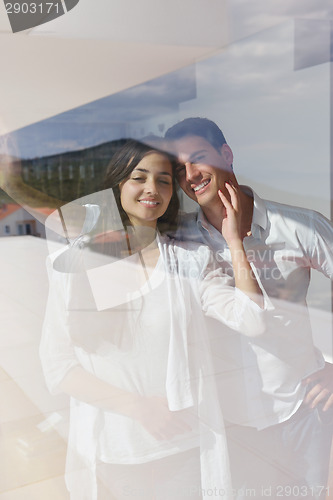 Image of relaxed young couple at home