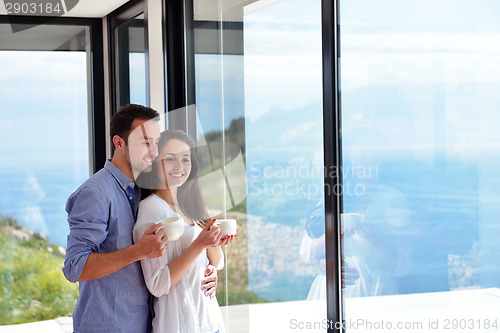 Image of relaxed young couple at home