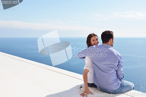 Image of relaxed young couple at home