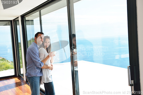 Image of relaxed young couple at home