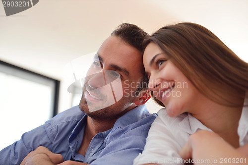 Image of relaxed young couple at home