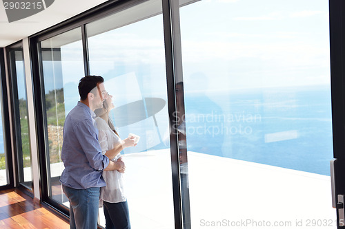 Image of relaxed young couple at home