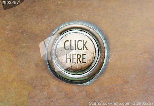 Image of Old button - click here