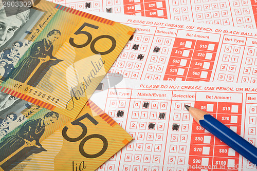 Image of Australian money and sports betting slip