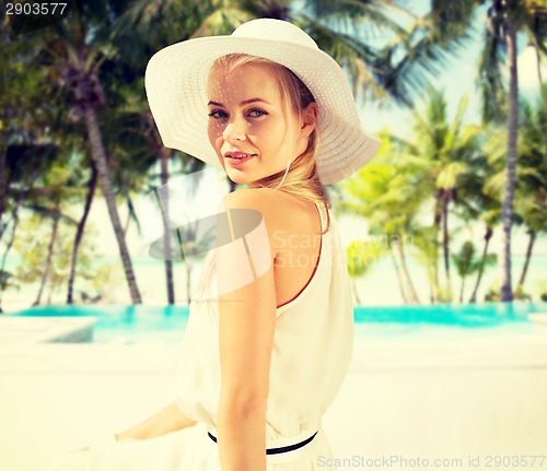 Image of beautiful woman enjoying summer outdoors