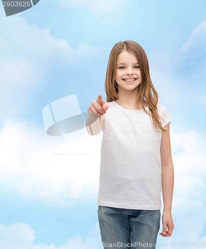 Image of little girl in blank white t-shirt pointing at you