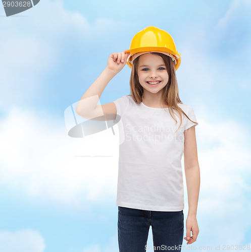 Image of smiling little girl in protective helmet