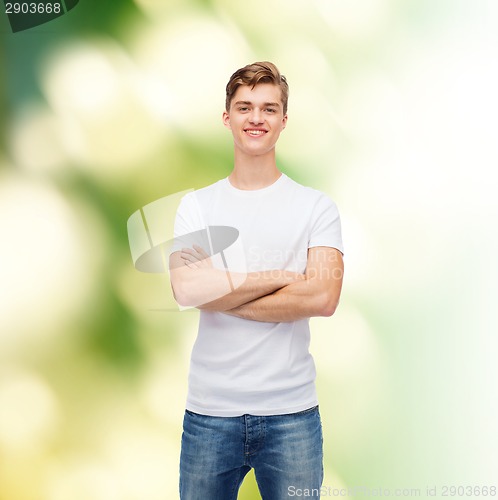 Image of smiling young man in blank white t-shirt