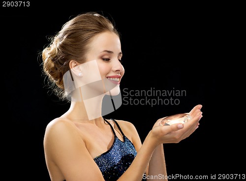 Image of smiling woman in evening dress