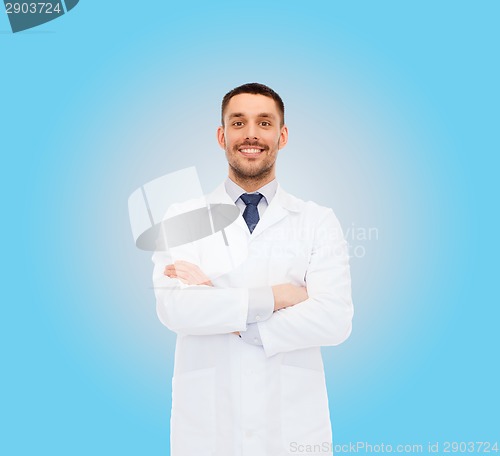 Image of smiling male doctor in white coat