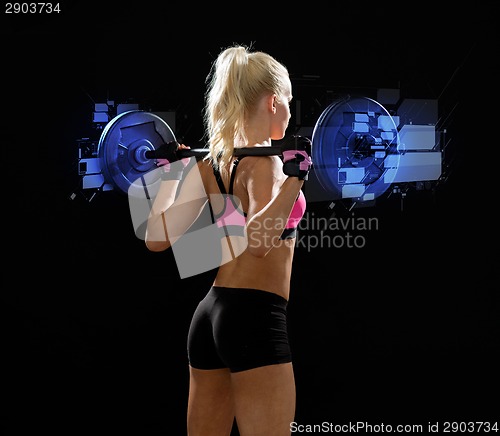 Image of sporty woman exercising with barbell from back