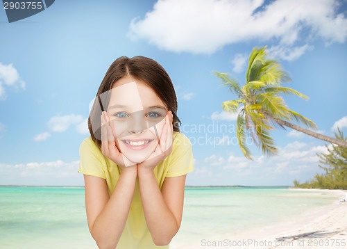 Image of smiling little girl over white background