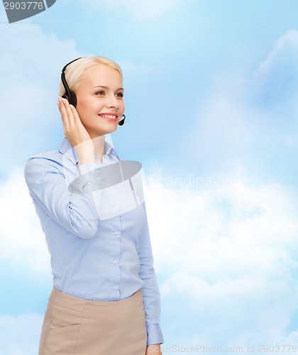 Image of friendly female helpline operator