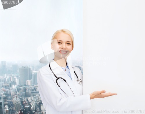 Image of smiling female doctor with stethoscope