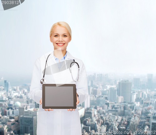 Image of female doctor with stethoscope and tablet pc