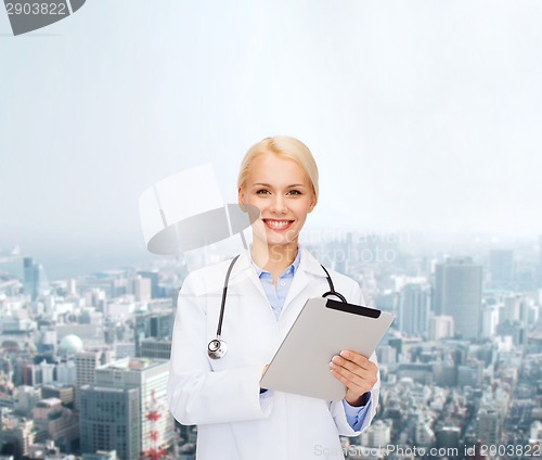 Image of female doctor with stethoscope and tablet pc